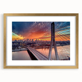 Abstract art print of a European scenery in muted gold and blue tones on a framed canvas, ideal for dining room decor.