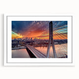 Textured abstract art print depicting a European scenery in muted earth tones, framed with a white mat.