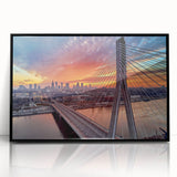 Large abstract wall art depicting a European scenery in muted earth tones, framed in black acrylic.