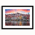 Colorful abstract art print of Porto scenery in vibrant hues on a black framed canvas, ideal for living room decor.