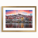 Abstract art print of Porto, Portugal in muted blue and gold tones on a framed canvas, suitable for dining room decor.