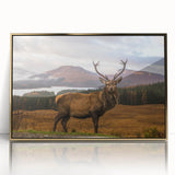 Art deco poster featuring a serene Scottish landscape in muted green and blue tones, framed in gold acrylic.