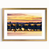 Textured art print of abstract Andalusian scenery in muted earth tones, framed in gold, ideal for bedroom ambiance.