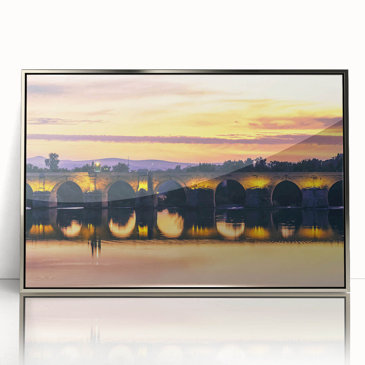Acrylic print of a serene Andalucian landscape in muted earth tones, framed in silver, suitable for modern art wall decor.