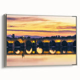 Vintage poster art of Andalucia, Spain, featuring vibrant colors on black, framed in silver, ideal for living room decor.