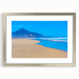 Extra large abstract art print of a textured European scenery in muted earth tones, framed in silver.