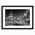 Extra large abstract art print of colorful, textured Madrid scenery on a black framed canvas, ideal for living room decor.