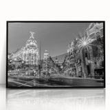 Large abstract wall art of Madrid scenery in muted earth tones on black framed acrylic.