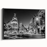 Black and white wall art of Madrid landscape on framed canvas, ideal for bedroom decor.