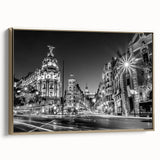 Framed canvas featuring a vintage black and white landscape of Madrid, ideal for bedroom wall art.
