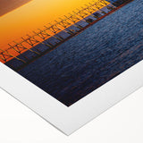 Art deco poster of Stockholm scenery in muted blue and yellow tones on rolled canvas, suitable for dining room decor.