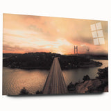 Large abstract wall art of a European scenery in muted blue and green tones on acrylic glass.