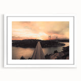 Abstract art print of a European landscape in muted earth tones, framed with a white mat, suitable for dining room decor.