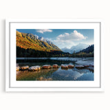 Abstract art print of a European landscape in muted earth tones, framed with a white mat, suitable for dining room decor.