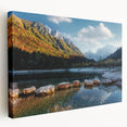Scenic Swiss landscape on stretched canvas, featuring lush green fields and distant mountains, in muted earth tones.