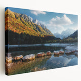 Scenic Swiss landscape on stretched canvas, featuring lush green fields and distant mountains, in muted earth tones.