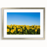 Textured abstract art print of a European scenery in silver frame, using cool blue and gray tones, ideal for bedroom art.