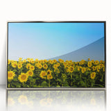 Mid-century modernist art depicting a serene European landscape in muted greens and blues on a framed acrylic print.