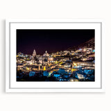 Abstract art print of Mexico City with muted earth tones on a framed white mat, suitable for dining room decor.