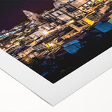 Art deco poster of Mexico City on rolled canvas, featuring bold geometric shapes and a vibrant color palette.