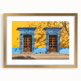 Extra large abstract art print of Oaxaca scenery, textured design in earth tones on a gold-framed canvas.