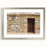 Textured art print of abstract Dubai skyline in muted silver and gray tones on a framed canvas, suitable for bedroom decor.