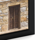 Framed canvas depicting a textured skyline of Dubai in black with vibrant, colorful accents.