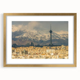 Extra large wall art featuring an abstract print of a Middle Eastern scenery in gold and earth tones, framed with a mat.