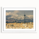 Abstract art print depicting a Middle Eastern scenery in muted earth tones on a white framed canvas.