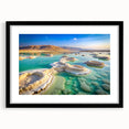 Extra large abstract art print of the Dead Sea in vibrant colors on a textured canvas, framed in black.