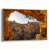 Framed canvas wall art featuring a vintage-style landscape painting of Jerusalem in muted gold and black tones.