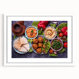 Abstract art print of a Middle Eastern landscape in muted earth tones on a white framed canvas.