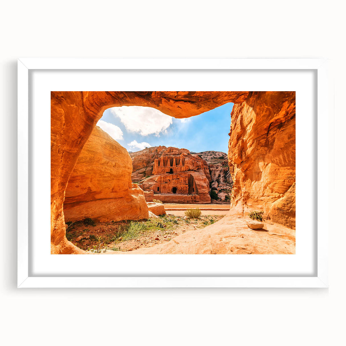Abstract art print of a Jordanian landscape in muted earth tones on a framed white mat.
