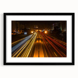 Abstract art print of a Middle Eastern scenery in vibrant colors on a textured, framed canvas, ideal for living room decor.