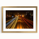 Extra large abstract art print depicting a textured Middle Eastern scenery in gold and earth tones, framed with a mat.