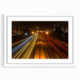 Abstract art print of Oman scenery in muted earth tones, framed with a white mat, suitable for dining room decor.