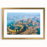 Abstract art print featuring textured scenery of Qatar in muted gold and brown tones on a large framed canvas.