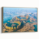 Framed canvas depicting a Qatar landscape in vintage poster style with muted gold and black tones.