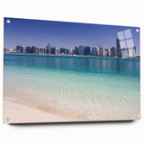 Large abstract wall art of the Abu Dhabi skyline in neutral tones on acrylic glass.