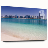 Large abstract wall art of Abu Dhabi skyline in muted gray and blue tones on acrylic glass.