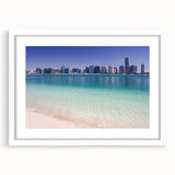 Abstract art print of Abu Dhabi skyline in pastel shades on a white framed poster, suitable for dining or bedroom decor.