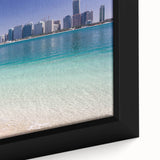 Black wall art featuring a textured, colorful Abu Dhabi skyline on framed canvas, ideal for living room decor.