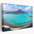 Side view of a stretched canvas depicting the serene waters and overwater bungalows of Bora Bora, ideal for kitchen wall art.