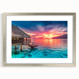 Textured art depicting an abstract ocean scene in Tahitian blues and greens, framed with a silver mat.