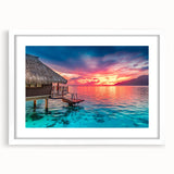 Abstract art print of a serene Tahitian landscape in soft blue and green tones on a framed white canvas.