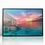 Large abstract wall art of Tahiti's oceanic scenery in vibrant blues and greens, framed in black acrylic.