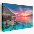 Large art print of a serene Tahitian landscape on stretched canvas, featuring lush greenery and calm blue waters.