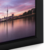 Extra large black wall art featuring a textured Auckland scenery with colorful accents, framed canvas.