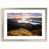 Textured art of an abstract New Zealand Canterbury landscape in soft gray and blue tones on a framed silver canvas.