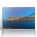 Art deco poster of Otago, New Zealand landscape in muted greens and blues on white framed acrylic.